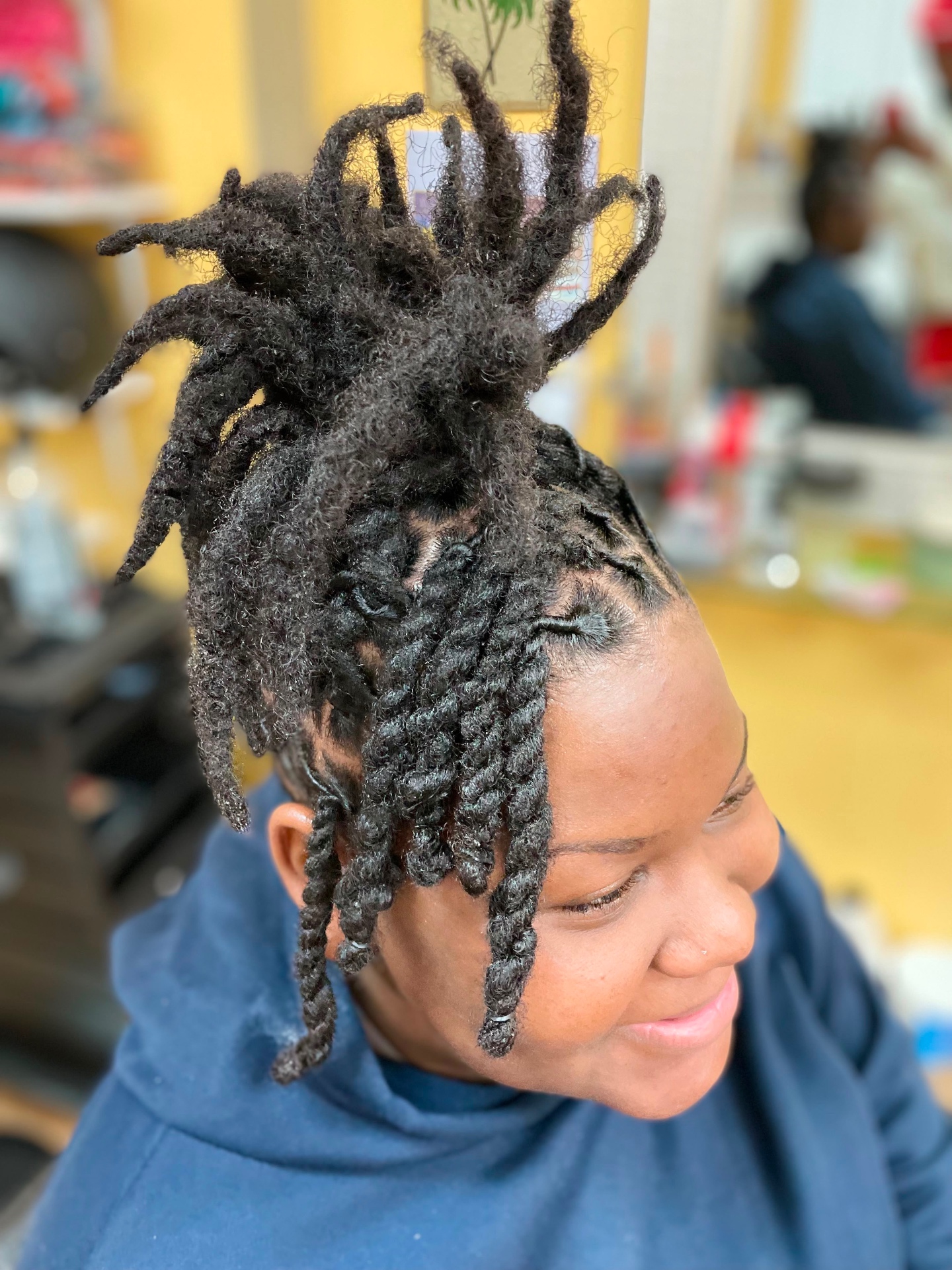 Boston Hair Creativity signature loc & braid work