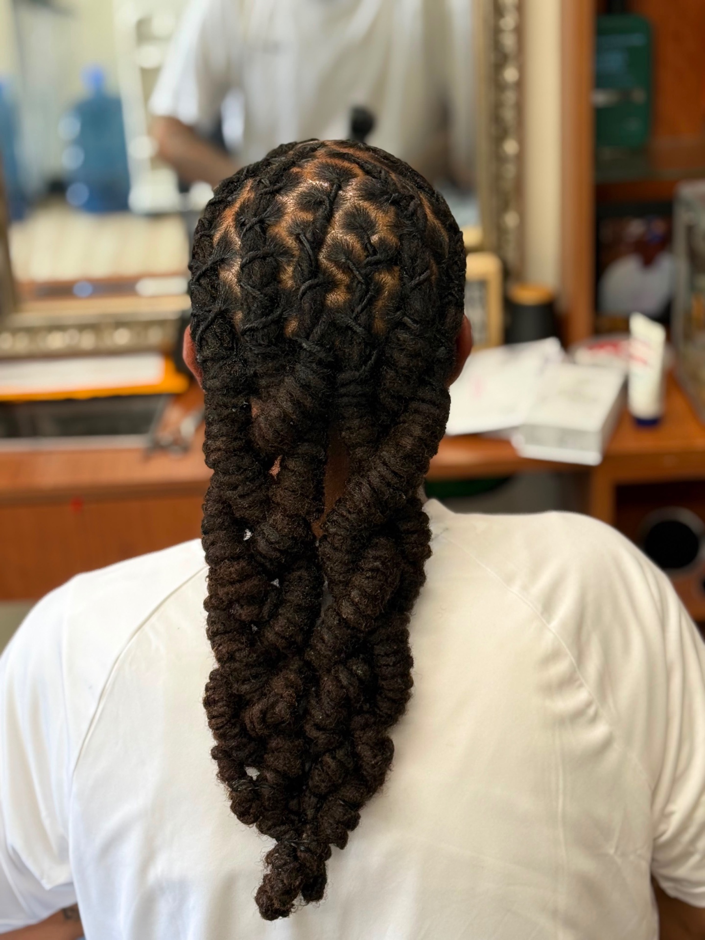 Boston Hair Creativity signature loc & braid work
