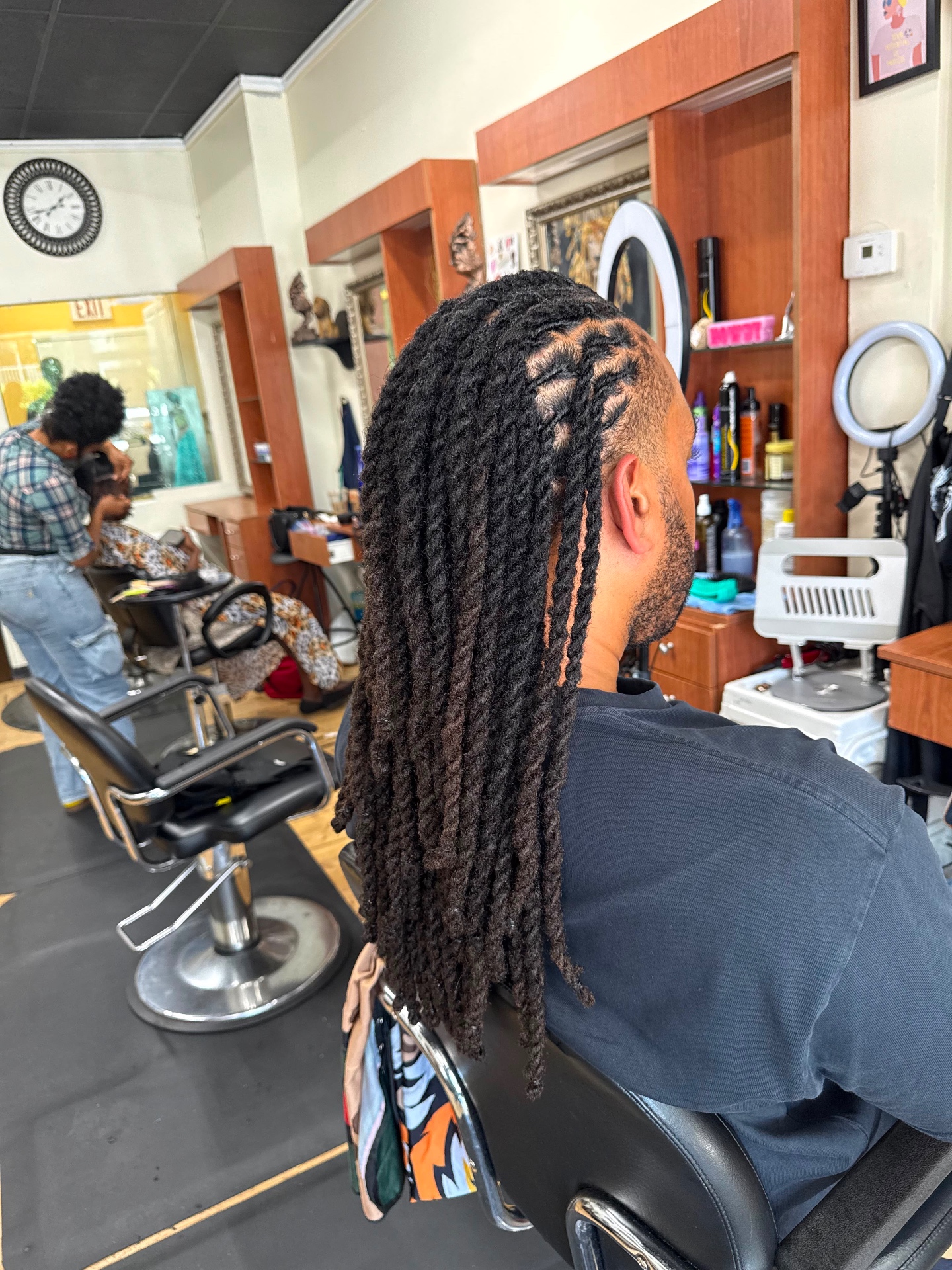 Boston Hair Creativity signature loc & braid work