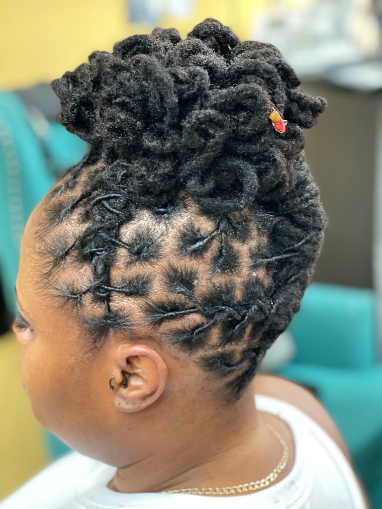 Boston Hair Creativity signature loc & braid work