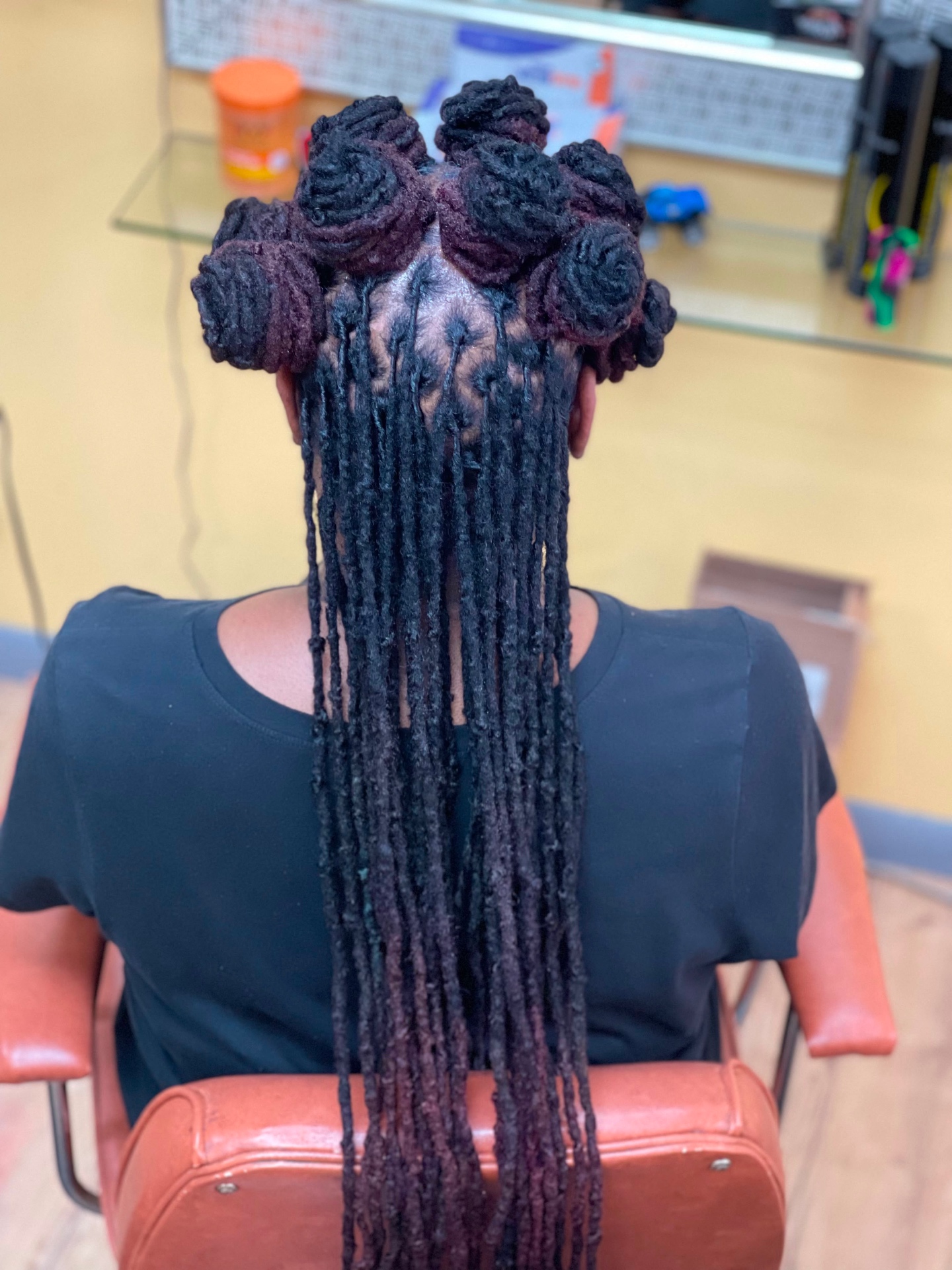 Boston Hair Creativity signature loc & braid work