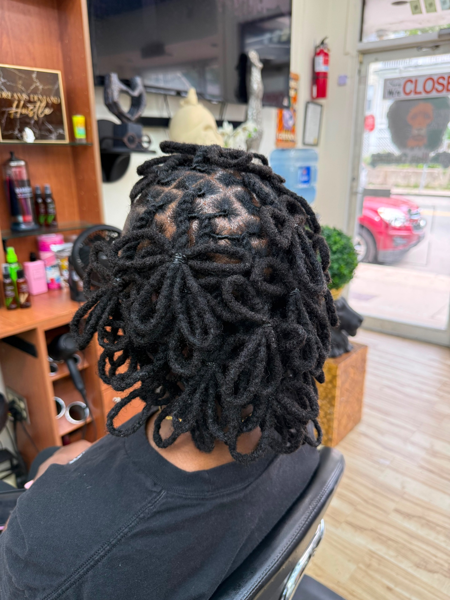 Boston Hair Creativity signature loc & braid work
