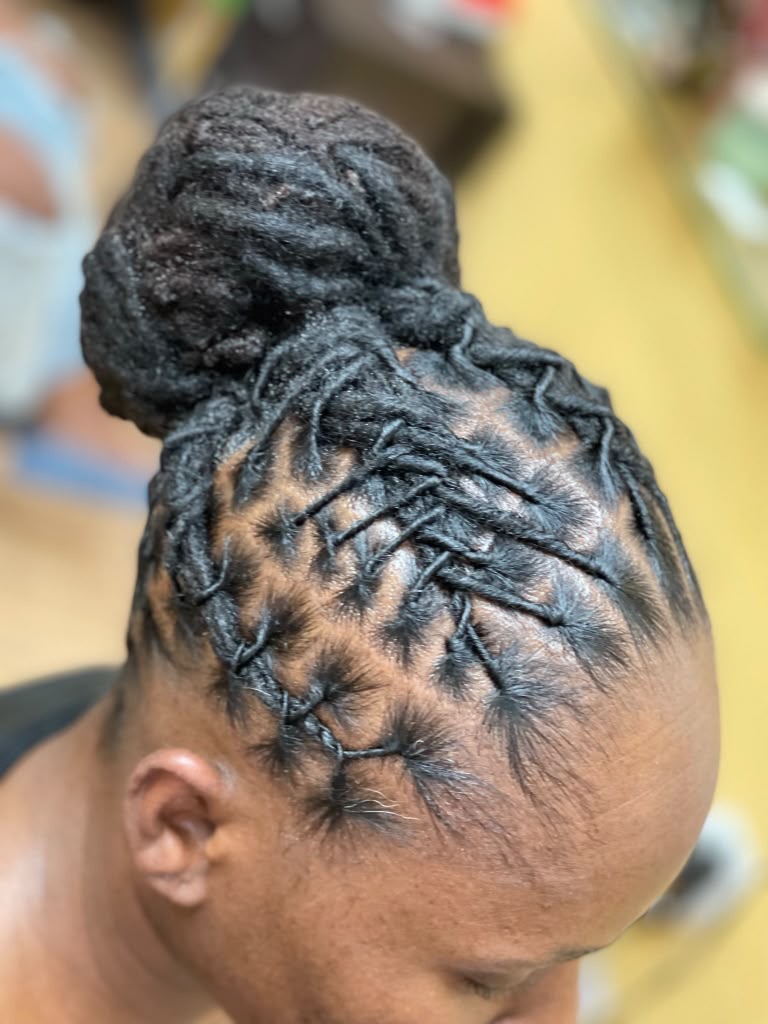 Boston Hair Creativity signature loc & braid work
